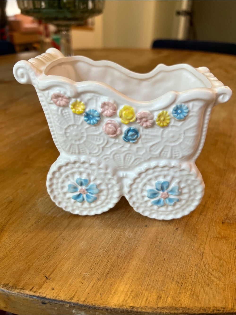White Ceramic Baby Carriage Planter with Pastel Floral Accents